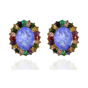 BRINCO OVAL COM BAGUETES EM VOLTA DA PEDRA