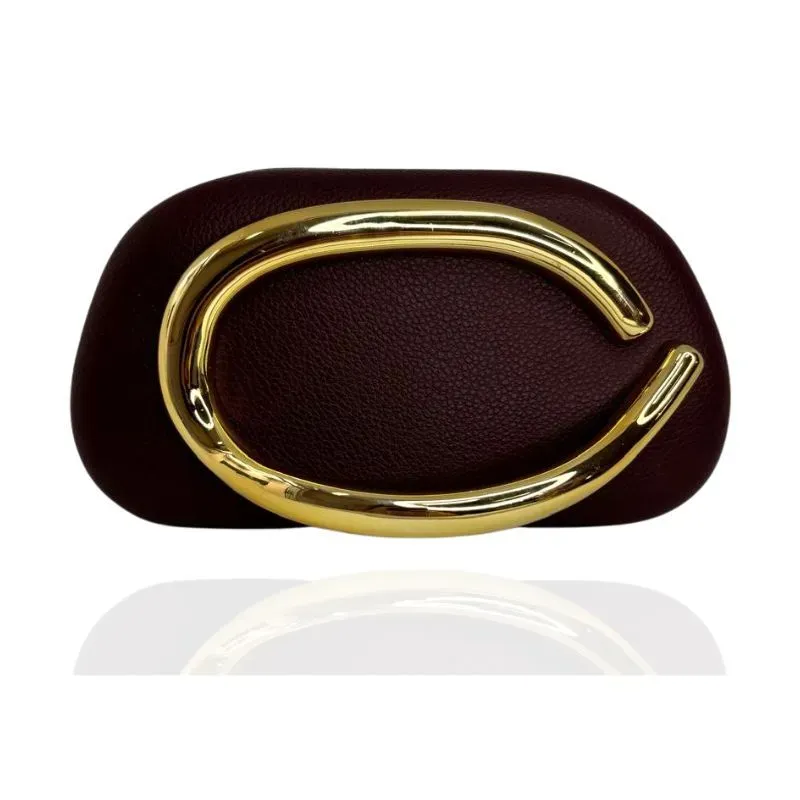 CLUTCH DETALHE DE MÃO DOURADO