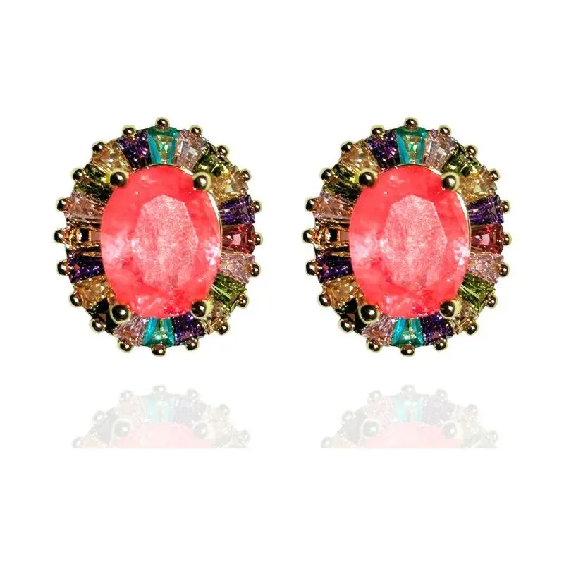 BRINCO OVAL COM BAGUETES EM VOLTA DA PEDRA